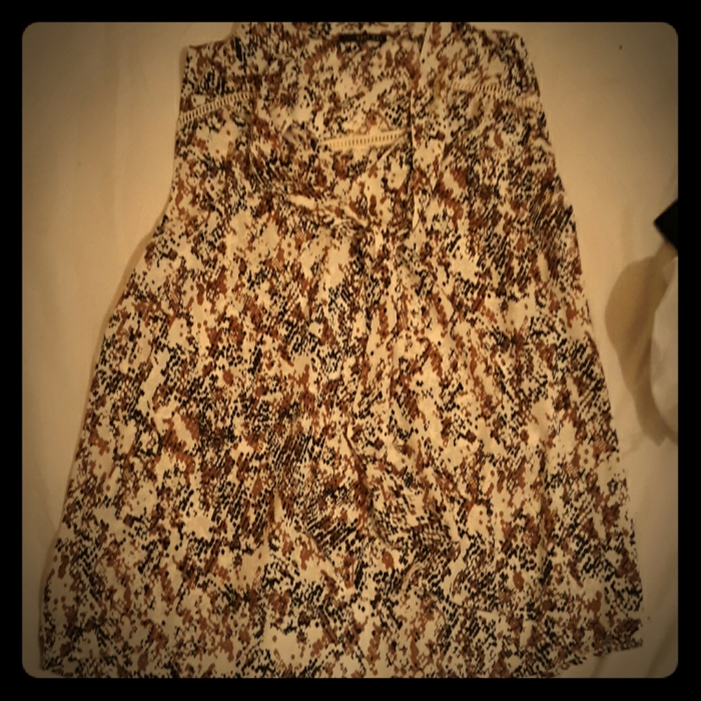 Sleeveless snakeskin shirt
